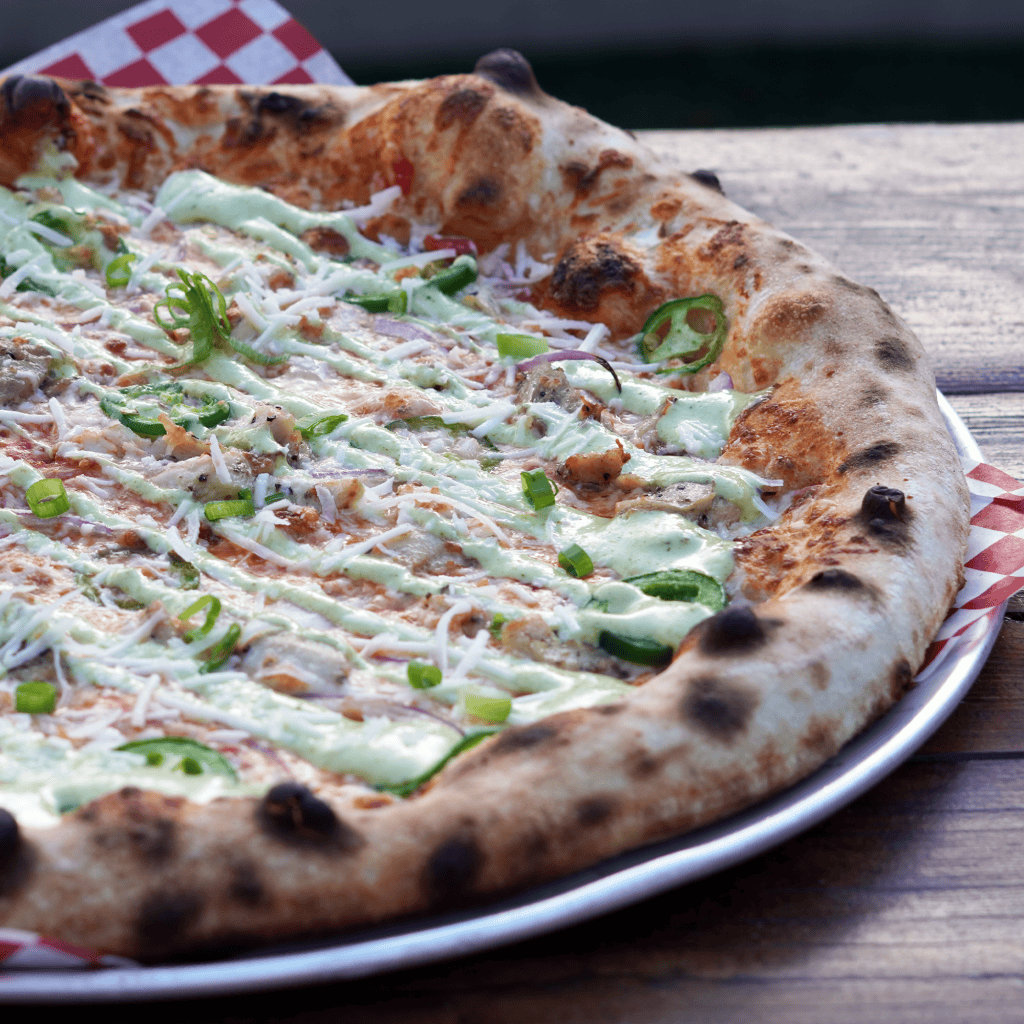 chicken zinger pizza at red bird brewing kelowna