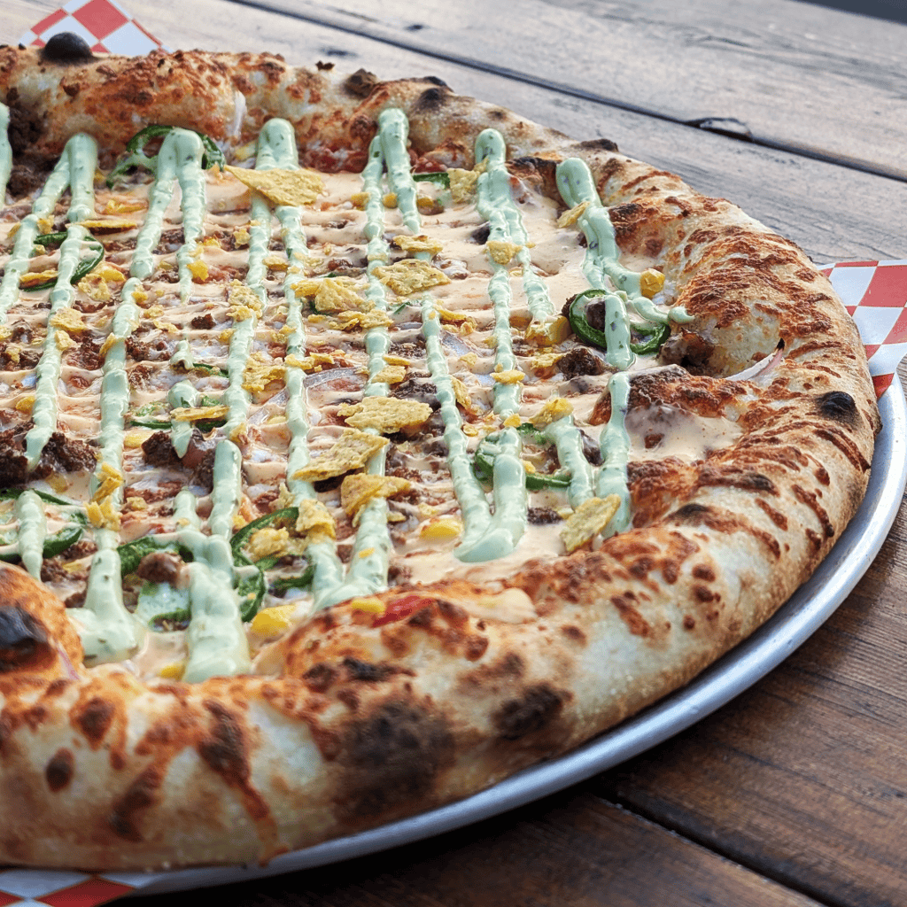 taco pizza at red bird brewing kelowna