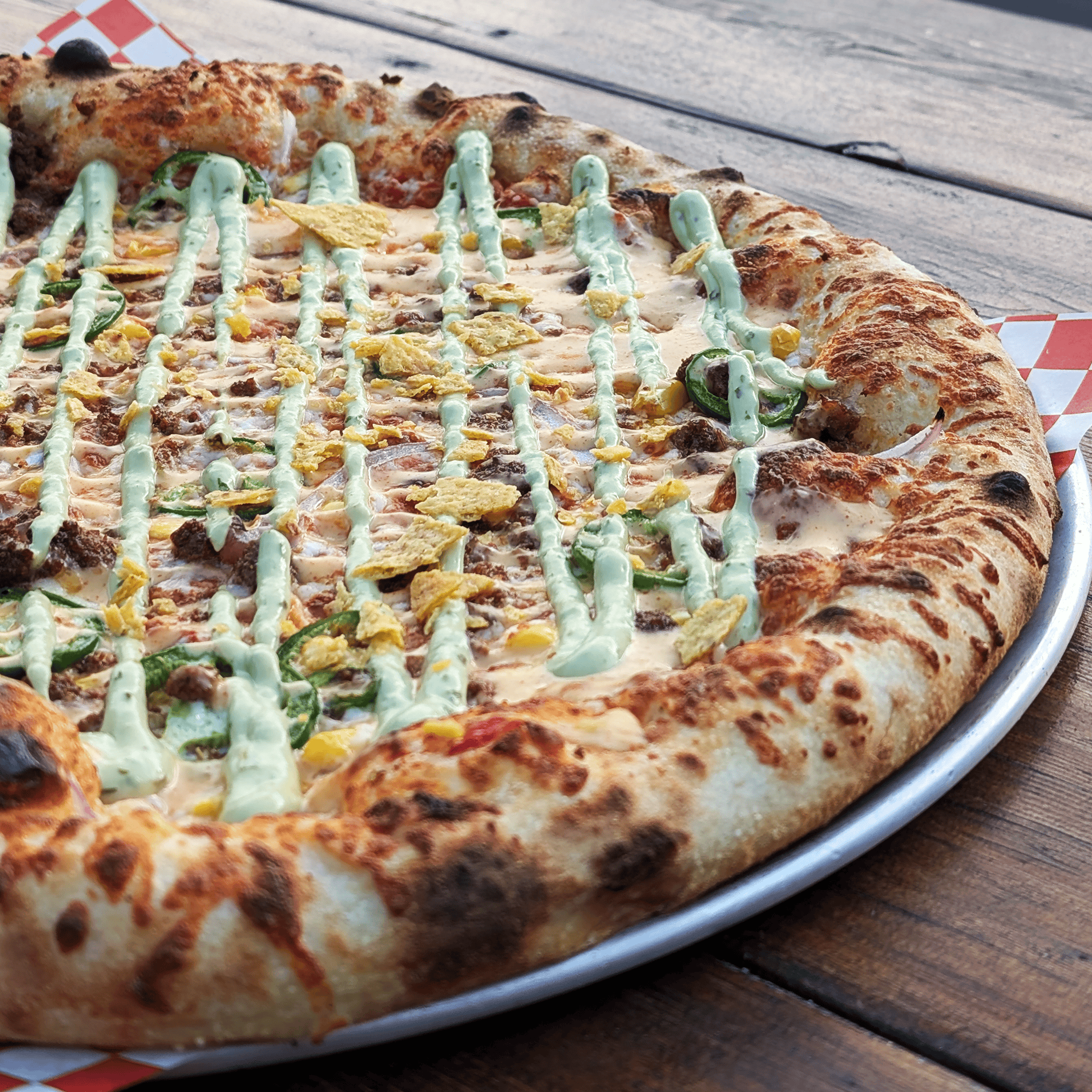 taco pizza at red bird brewing kelowna