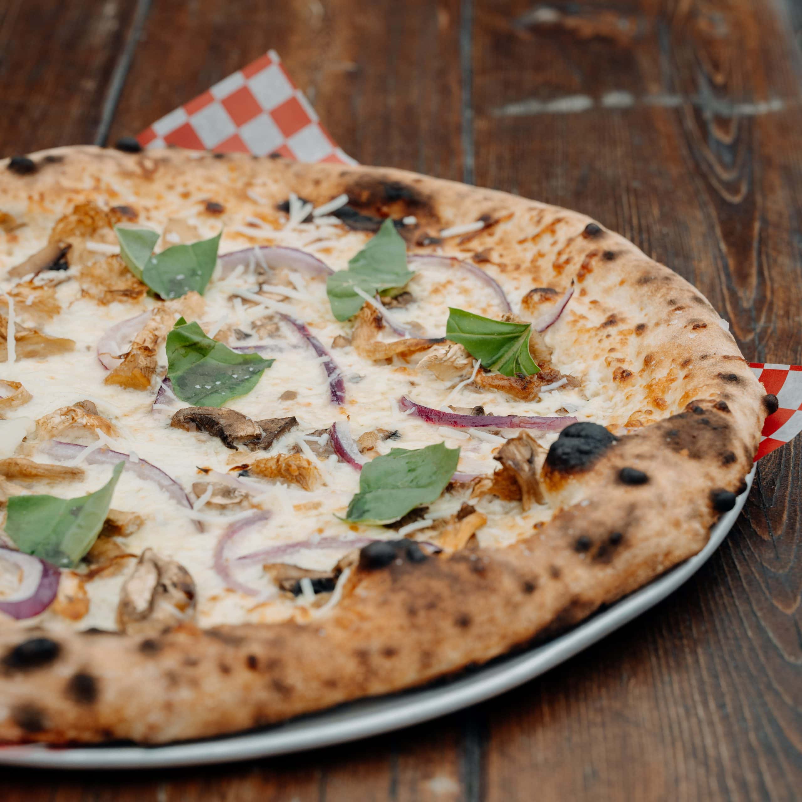 truffled mushroom pizza at red bird brewing kelowna