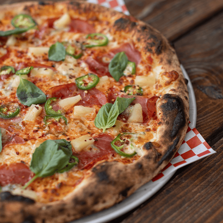the maui wowie pineapple and jalapeno pizza at red bird brewing kelowna