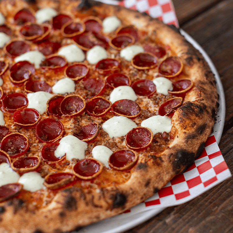 ultimate pepperoni pizza at red bird brewing kelowna