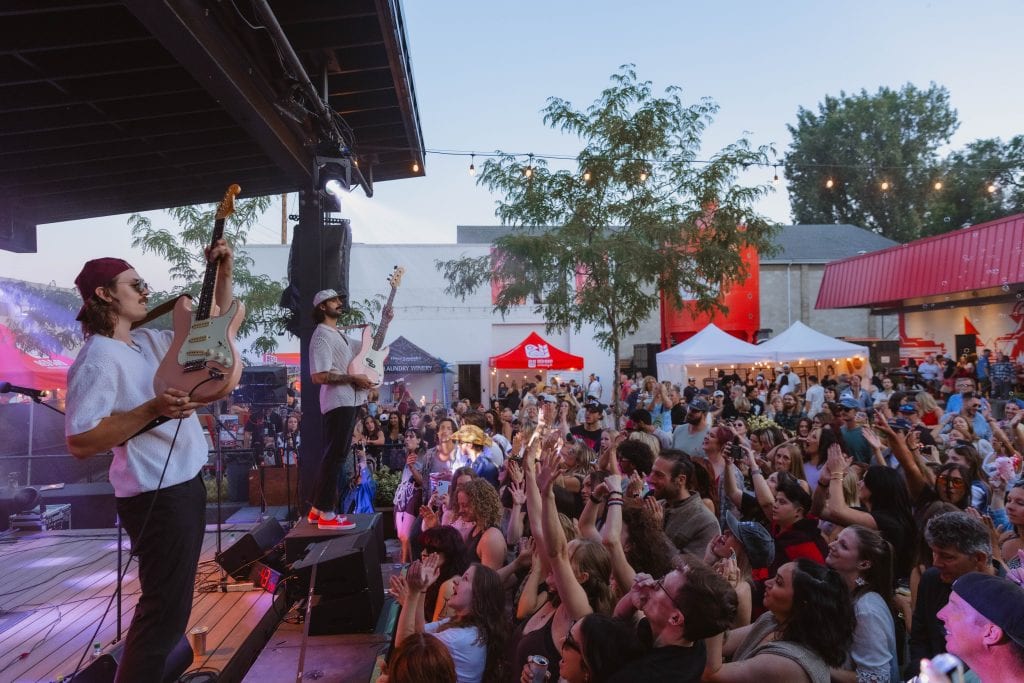 live music performance and a large crouwed at red bird brewing kelowna